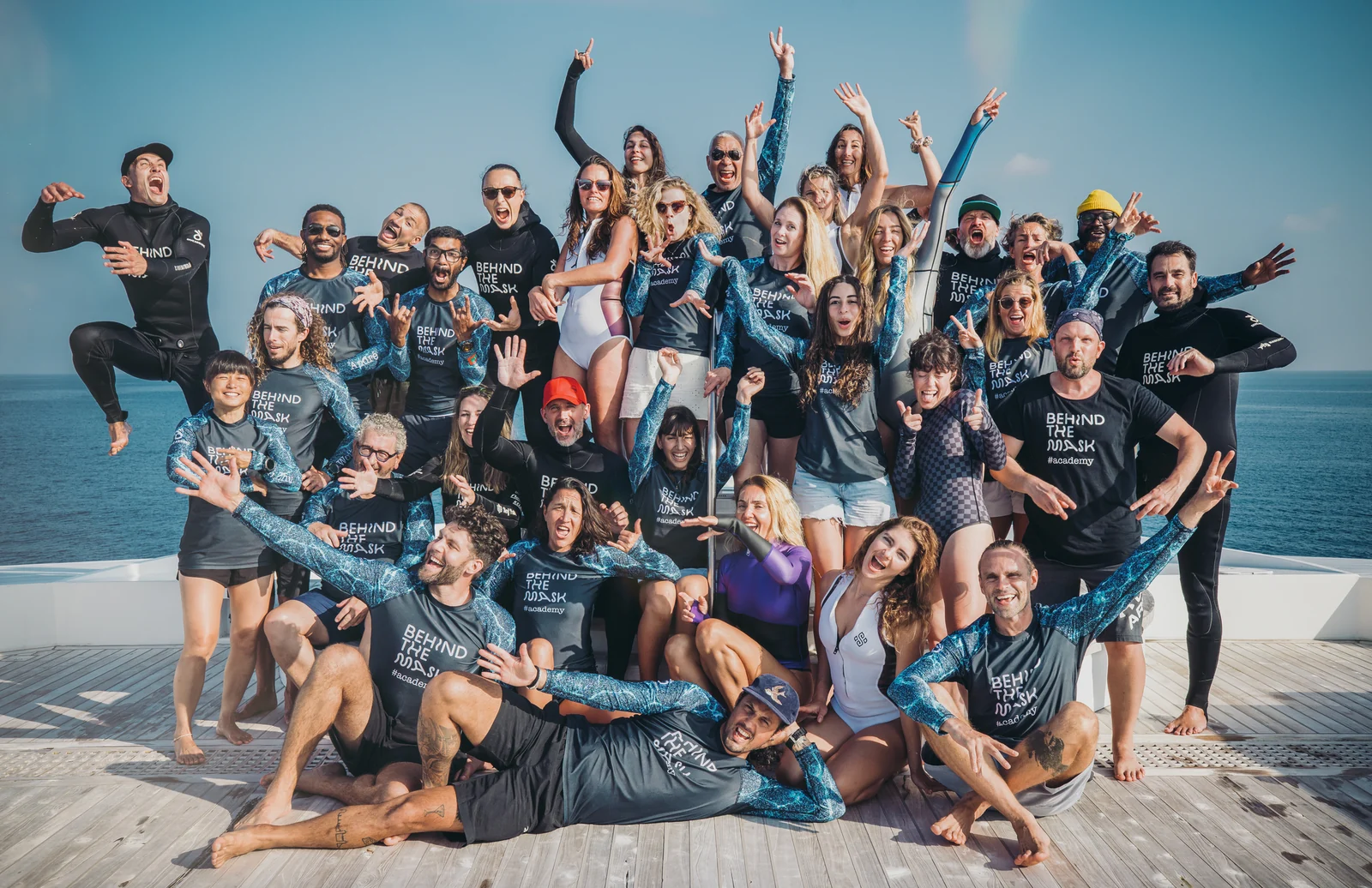 Behind the Mask Academy group on a boat deck