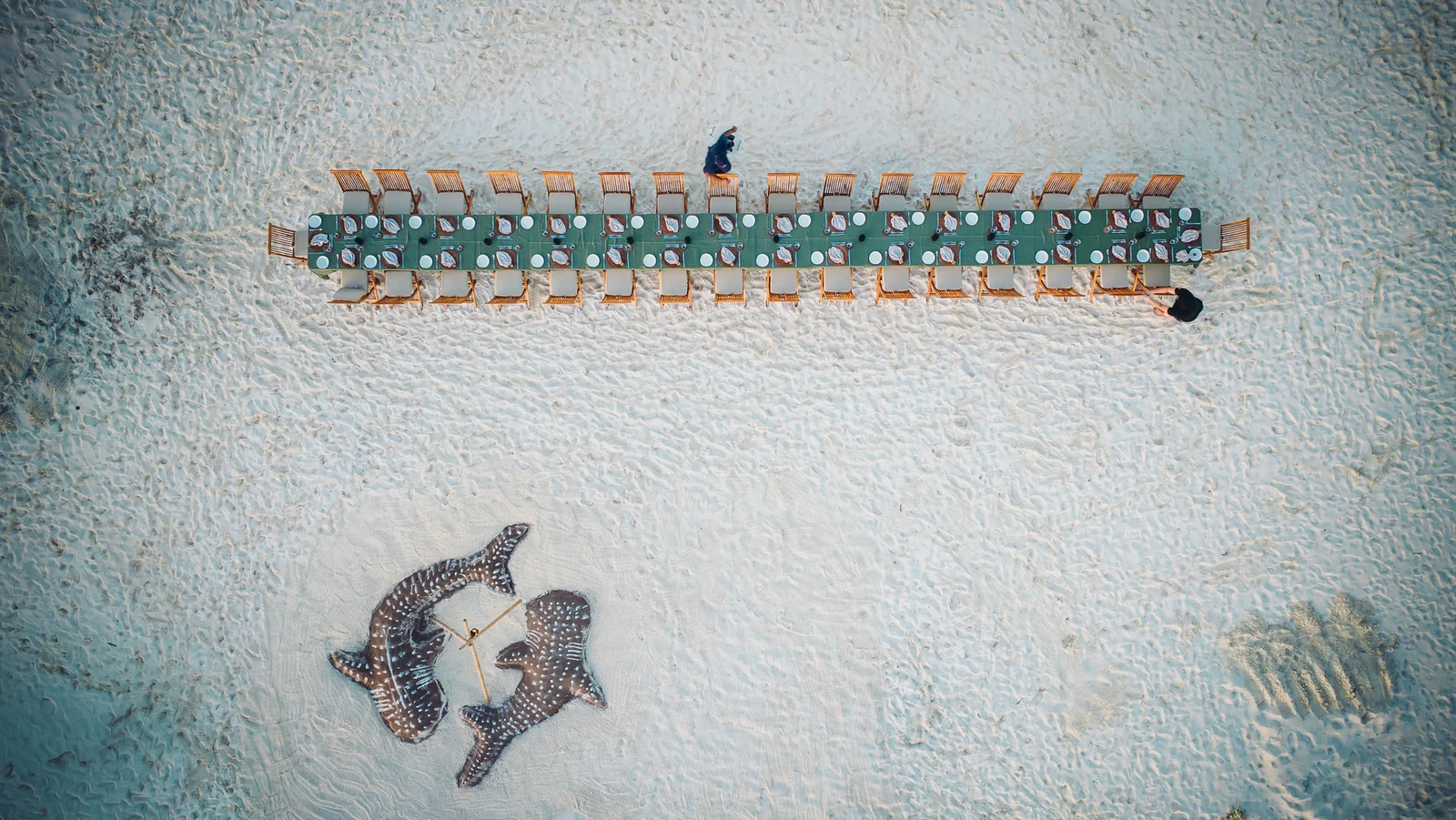 A long dining table on a Maldivian sandbank